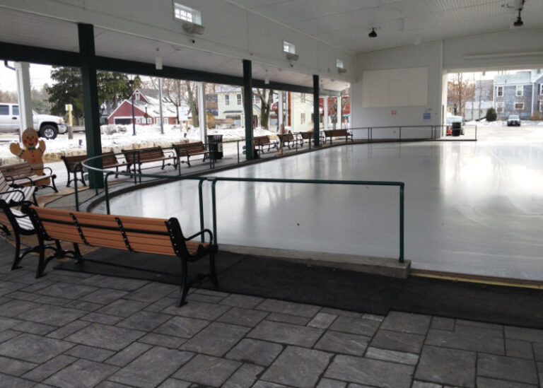 Ice rink with benches and partially inside