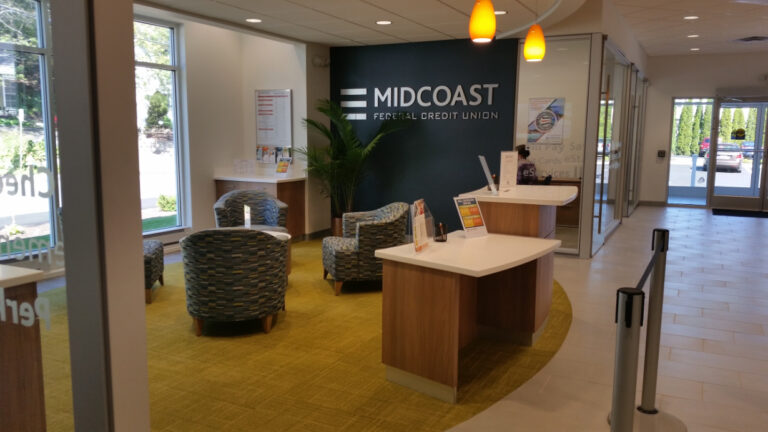Midcoast logo sign in seating area