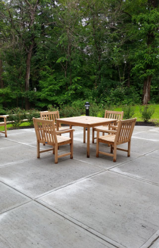 Cement patio with patio table and chairs