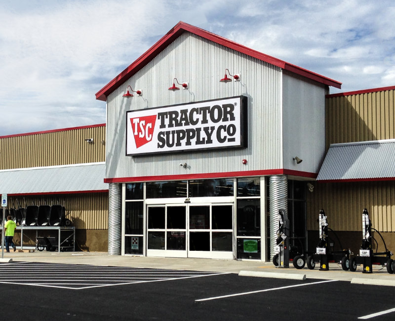 Tractor Supply co logo on metal and red building