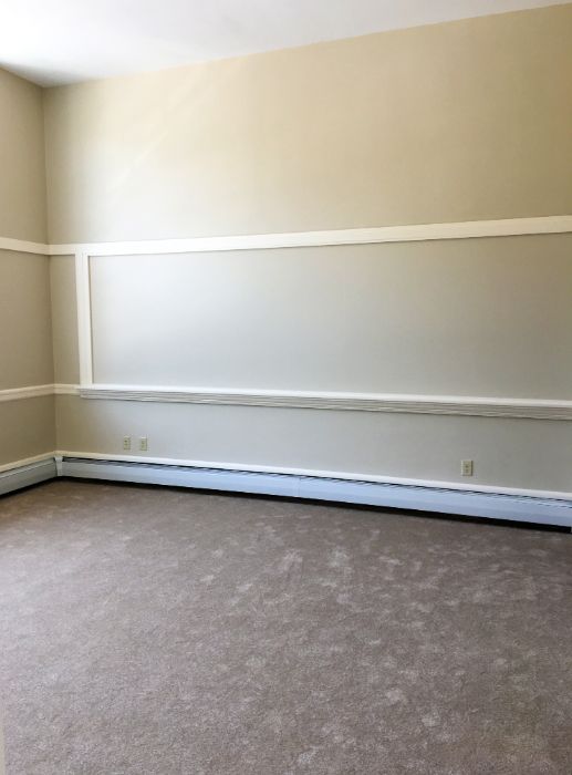 Empty room with rug